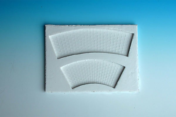 Spoerle 1242 -  Route de campagne 2 coudes de trottoir, plaques de 40cm transversales, Ã  R  125 mm - paire