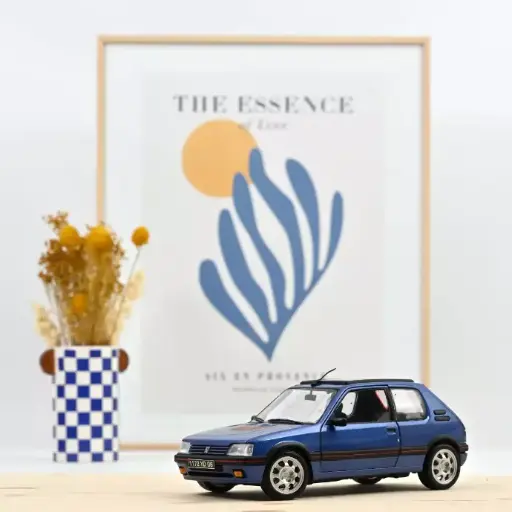 [184844] Peugeot 205 GTi 1.9 with windowroof 1992 Miami Blue 1:18 Norev 184844 
